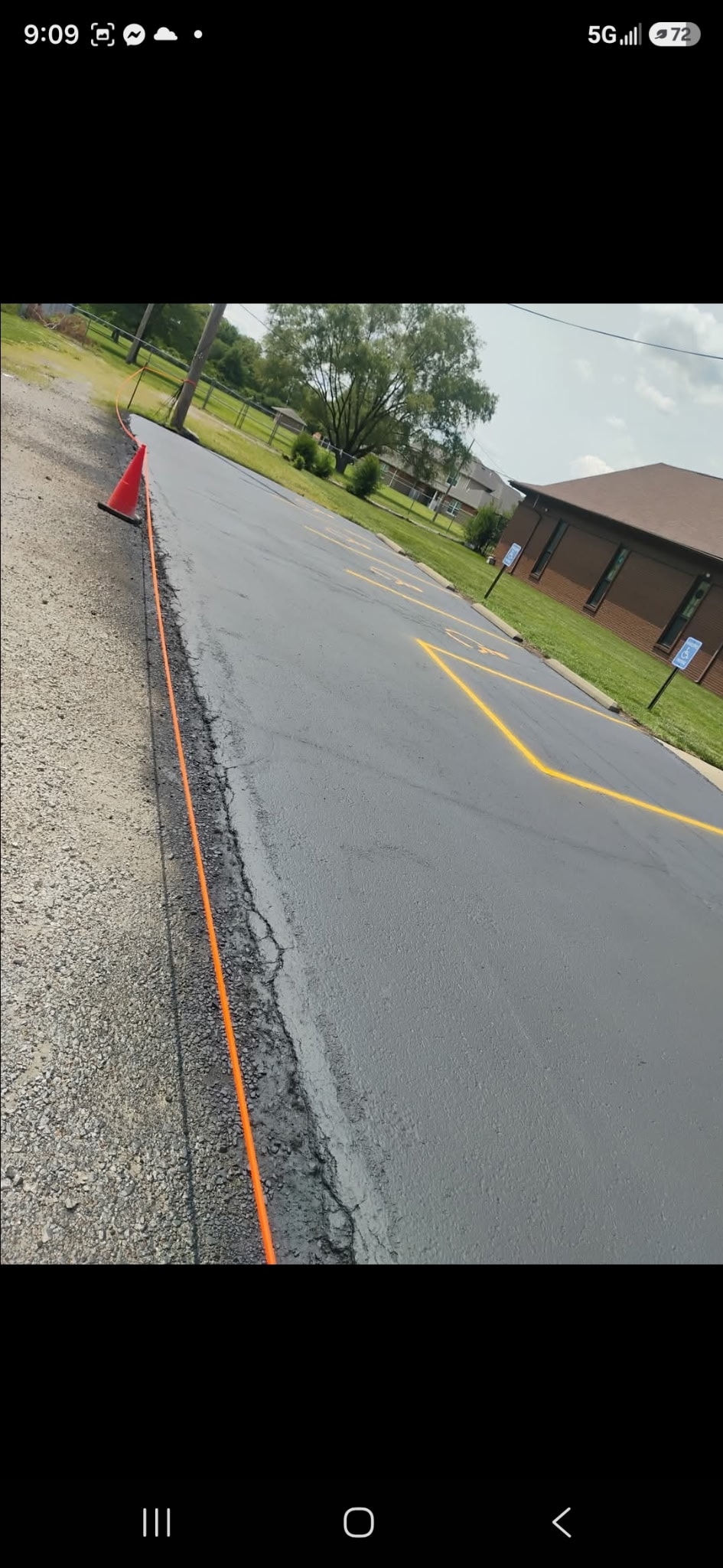 Residential driveway freshly sealed after — Silver Lining Asphalt