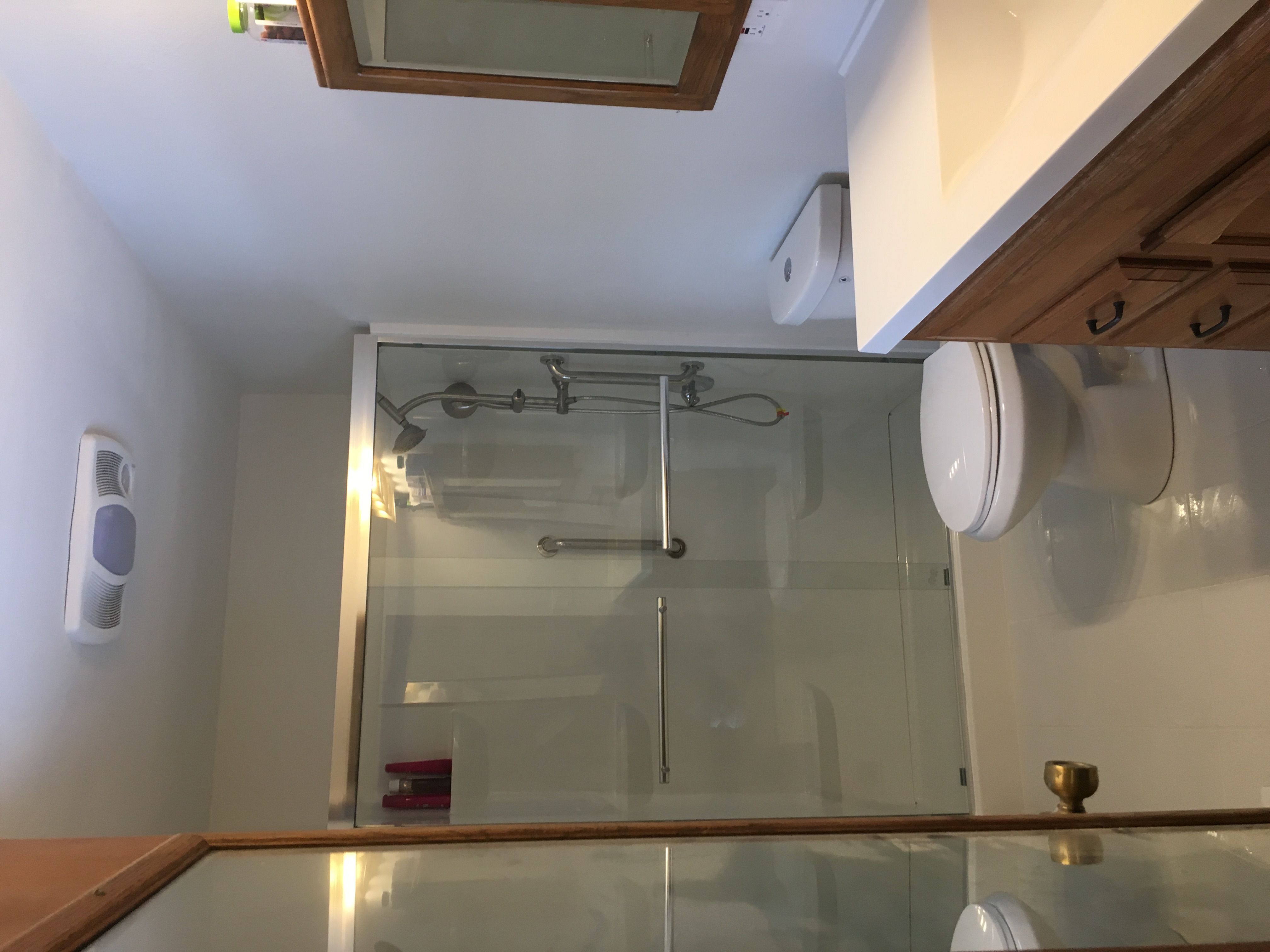 Bathroom after remodel — epoxy floor, new vanity and fixtures